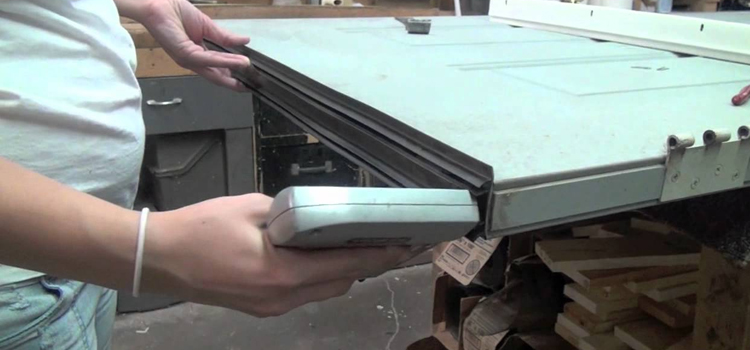 damaged steel door repair Holiday