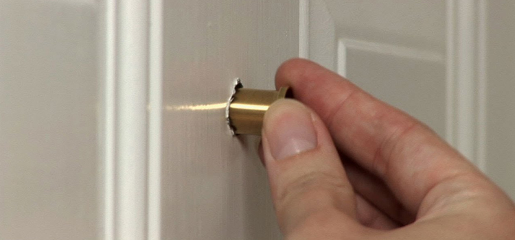 peephole door repair in Holiday
